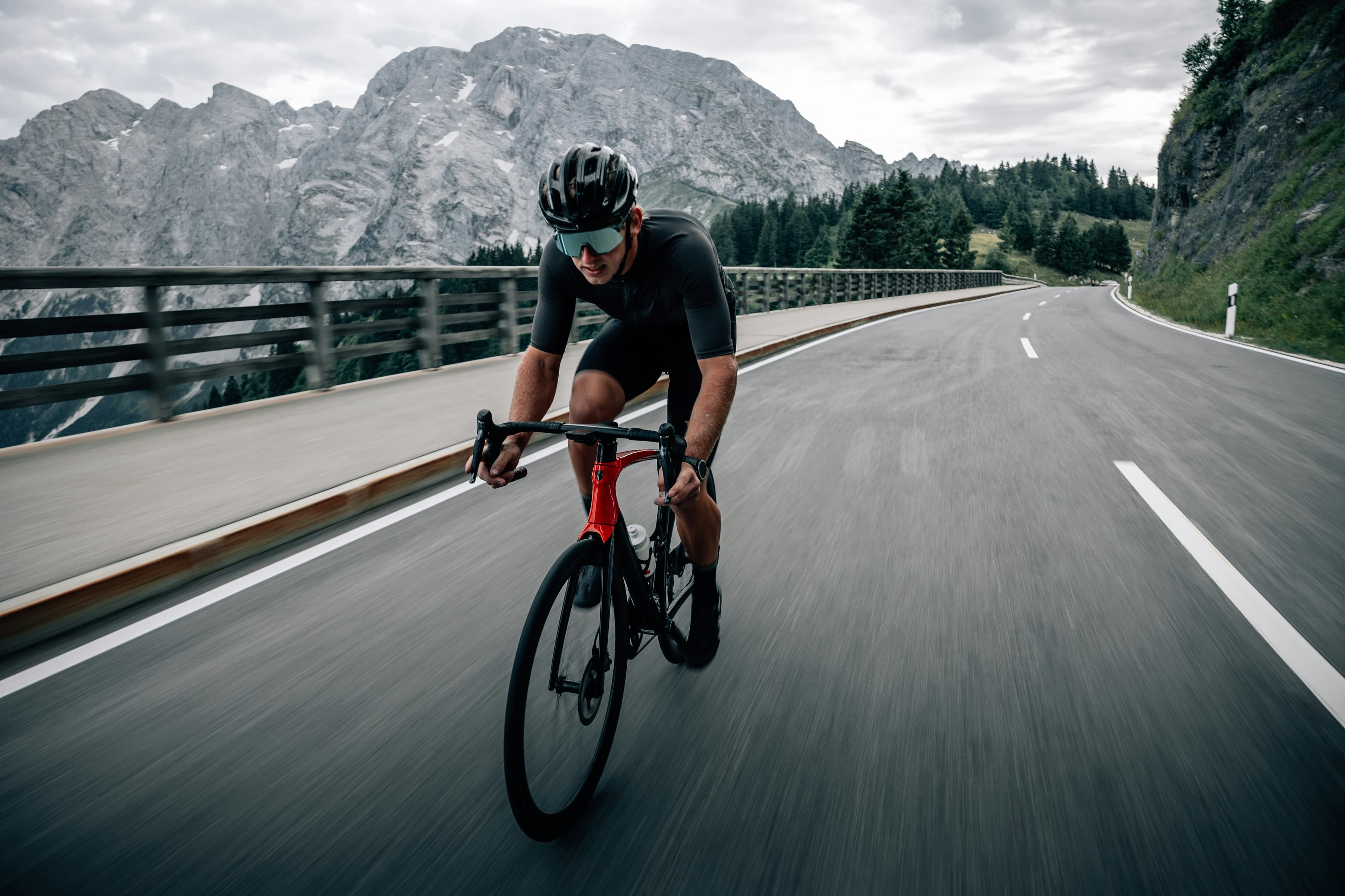 Cyclist riding on a mountain road
